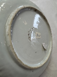 A Chinese blue and white plate with a relief-moulded rim, Wanli