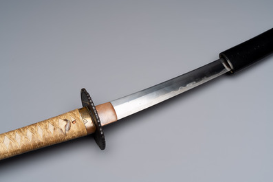 A Japanese katana, signed Yamashiro no Kami Fujiwara Kunikiyo, inscribed 'forged from Nanban tetsu' and chrysanthemum crest, with koshirae, ca. 1629-1665