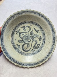 An unusual Chinese blue and white celadon-back 'Buddhist Lion' plate, Ming