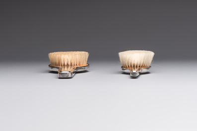 An Art Deco 12-piece silver toiletry set, Wolfers Fr&egrave;res, Brussels, 20th C.