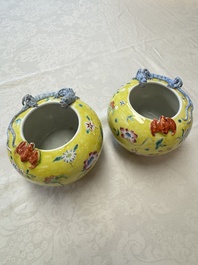 A pair of Chinese famille rose yellow-ground water pots with floral design and applied chilong and bats, Qianlong mark, 19/20th C.