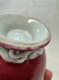 A Chinese famille rose ruby-ground 'Landscape Scroll' covered tea caddy and a covered milk jug, Yongzheng