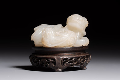 A Chinese carved jade 'Buddhist Lions' group, 19th C.