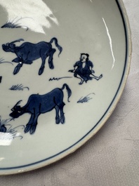 A Chinese blue and white ko-sometsuke 'Buffalo Herder' plate for the Japanese market, Tianqi