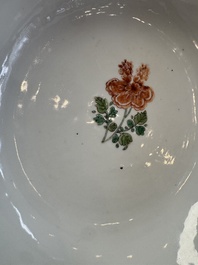 A Chinese famille verte bowl with bird and butterflies among flowers, lozenge mark, Kangxi