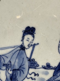 A Chinese blue and white 'Elegant Ladies in a Garden' dish, Qianlong
