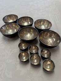A group of 12 Chinese silver-lined coconut 'Shou 壽' bowls and cups, Wang Hengxin 王恆馨 marks, 19/20th C.
