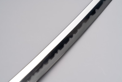 A Japanese katana, signed Ishidō Teruhide saku, with koshirae and shirasaya, Shōwa, 20th C.