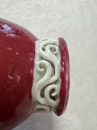 A Chinese famille rose ruby-ground 'Landscape Scroll' covered tea caddy and a covered milk jug, Yongzheng