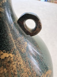 A Japanese patinated bronze vase, 20th C.
