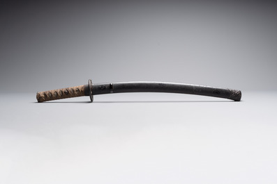 A Japanese wakizashi, signed Izumi no Kami Kanesada, with koshirae, Edo, 18/19th C.