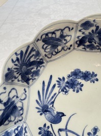 A pair of Japanese Arita blue and white 'Birds among Flowering Branches' plates, Edo 18th C.