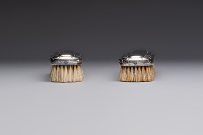 An Art Deco 12-piece silver toiletry set, Wolfers Fr&egrave;res, Brussels, 20th C.