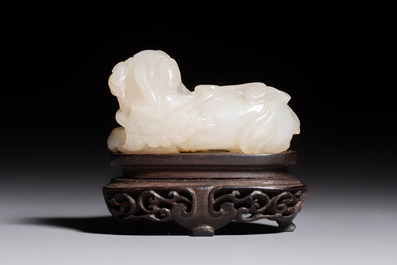 A Chinese carved jade 'Buddhist Lions' group, 19th C.