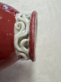 A Chinese famille rose ruby-ground 'Landscape Scroll' covered tea caddy and a covered milk jug, Yongzheng