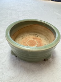A Chinese Longquan celadon 'Bagua' tripod censer, Ming