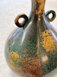 A Japanese patinated bronze vase, 20th C.