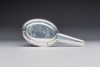 An Art Deco 12-piece silver toiletry set, Wolfers Fr&egrave;res, Brussels, 20th C.