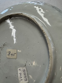A Chinese blue and white plate with a relief-moulded rim, Wanli