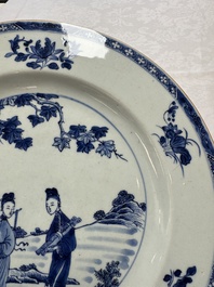 A Chinese blue and white 'Elegant Ladies in a Garden' dish, Qianlong