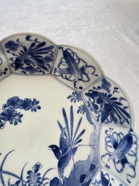 A pair of Japanese Arita blue and white 'Birds among Flowering Branches' plates, Edo 18th C.