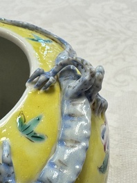 A pair of Chinese famille rose yellow-ground water pots with floral design and applied chilong and bats, Qianlong mark, 19/20th C.