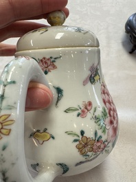 A Chinese famille rose 'Birds and Insects among Flowers' teapot on a later wooden stand, Yongzheng