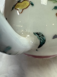 A Chinese famille rose 'Birds and Insects among Flowers' teapot on a later wooden stand, Yongzheng
