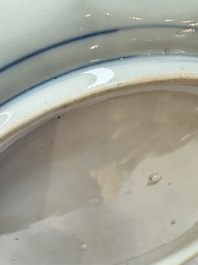 A pair of Japanese Arita blue and white 'Birds among Flowering Branches' plates, Edo 18th C.