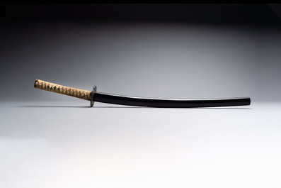 A Japanese katana, signed Yamashiro no Kami Fujiwara Kunikiyo, inscribed 'forged from Nanban tetsu' and chrysanthemum crest, with koshirae, ca. 1629-1665