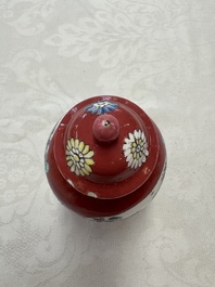 A Chinese famille rose ruby-ground 'Landscape Scroll' covered tea caddy and a covered milk jug, Yongzheng