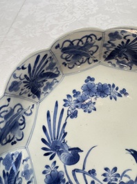 A pair of Japanese Arita blue and white 'Birds among Flowering Branches' plates, Edo 18th C.