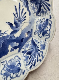 A pair of Japanese Arita blue and white 'Birds among Flowering Branches' plates, Edo 18th C.