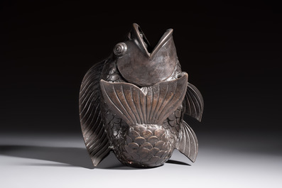 A Chinese or Japanese bronze carp-form vase, 19/20th C.