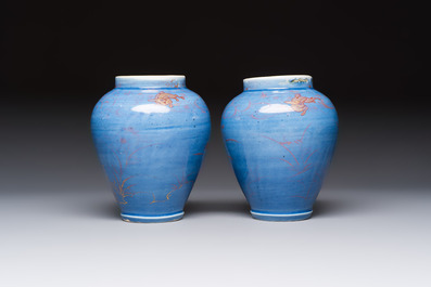 A rare pair of Japanese gilt-decorated blue-ground vases, Edo, late 17th C.