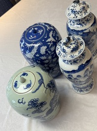 A pair of Chinese blue and white covered vases and two covered jars, Kangxi mark, 19th C