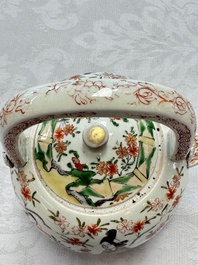 A Japanese Arita wine pot and cover with figural design, Edo, 17th C.
