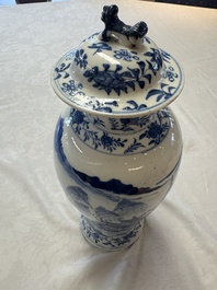 A pair of Chinese blue and white covered vases and two covered jars, Kangxi mark, 19th C