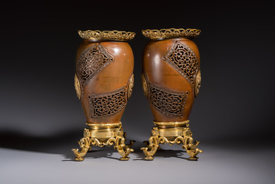 A pair of Belgian bronze and ormolu-mounted Japonism vases, Compagnie des Bronzes de Bruxelles, 19th C.