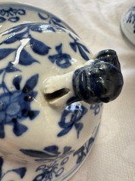 A pair of Chinese blue and white covered vases and two covered jars, Kangxi mark, 19th C