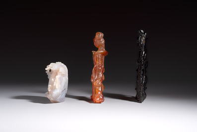 A group of ten Chinese hardstone and cherry amber carvings, 20th C.