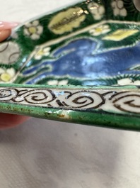 A Chinese verte biscuit eight-piece sweetmeat set with flying horses, 19th C.