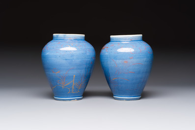 A rare pair of Japanese gilt-decorated blue-ground vases, Edo, late 17th C.