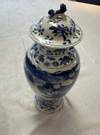 A pair of Chinese blue and white covered vases and two covered jars, Kangxi mark, 19th C