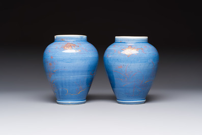 A rare pair of Japanese gilt-decorated blue-ground vases, Edo, late 17th C.
