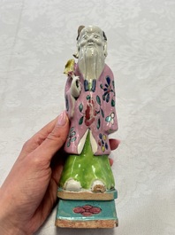 Two Chinese Dehua blanc-de-Chine Buddhist lions, three famille rose figures, and a white-glazed group, Kangxi and later