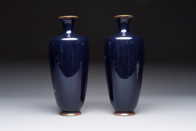 A pair of Japanese silver-wired cloisonn&eacute; enamel vases with birds among flowering branches, Meiji period, 19th C.