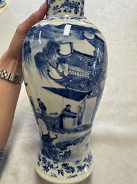 A pair of Chinese blue and white covered vases and two covered jars, Kangxi mark, 19th C