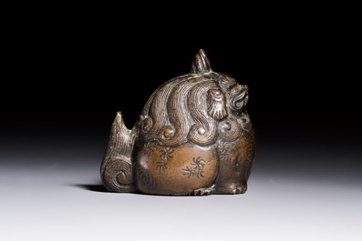 A Japanese bronze 'Shishi' paperweight, Meiji, 19th C.