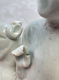 Two Chinese Dehua blanc-de-Chine Buddhist lions, three famille rose figures, and a white-glazed group, Kangxi and later